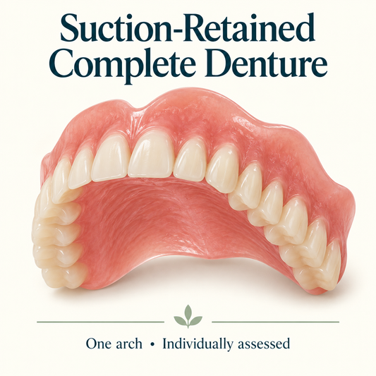 A complete removable upper denture with pink base and artificial teeth. Educational illustration.